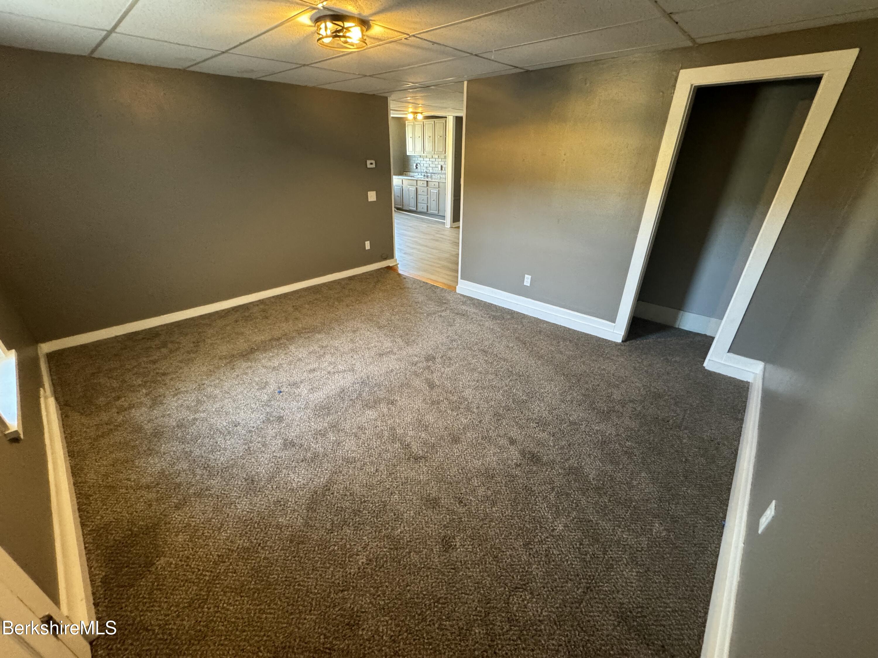 88 Summer Street, Unit 3C Adams, MA 01220 - Photo 9 of 11 a view of an empty room with window