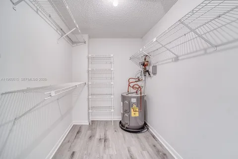 a view of a room with racks on the wall