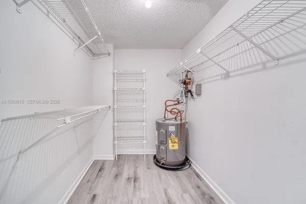 a view of a room with racks on the wall