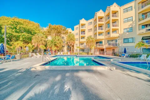 a view of street with tall buildings