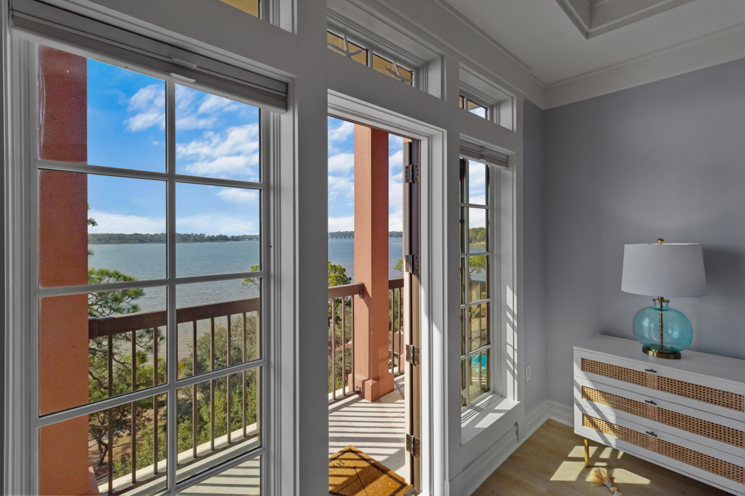 1101 Prospect Promenade, Unit 403 Panama City Beach, FL 32413 - Photo 13 of 74 a view of a balcony and a floor to ceiling window