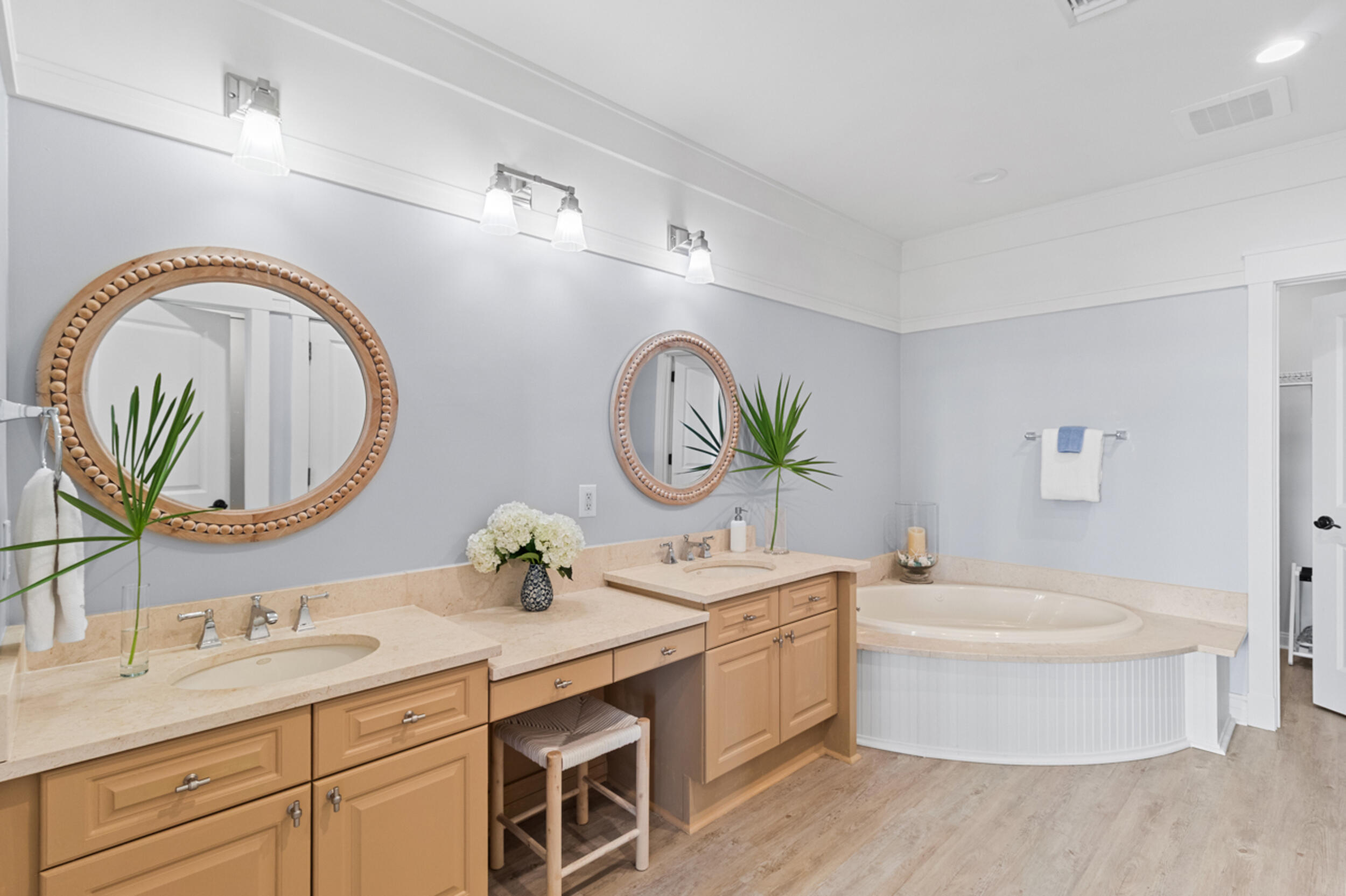 1101 Prospect Promenade, Unit 403 Panama City Beach, FL 32413 - Photo 17 of 74 a bathroom with a double vanity sink and a mirror