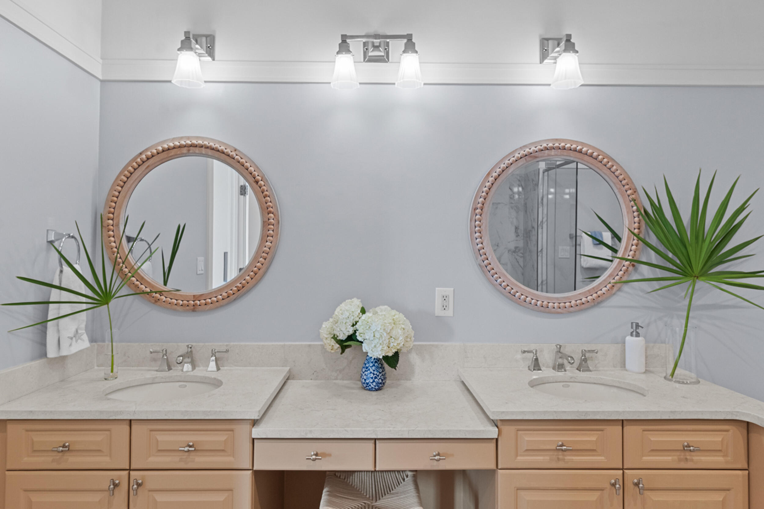 1101 Prospect Promenade, Unit 403 Panama City Beach, FL 32413 - Photo 20 of 74 a bathroom with a sink and a mirror