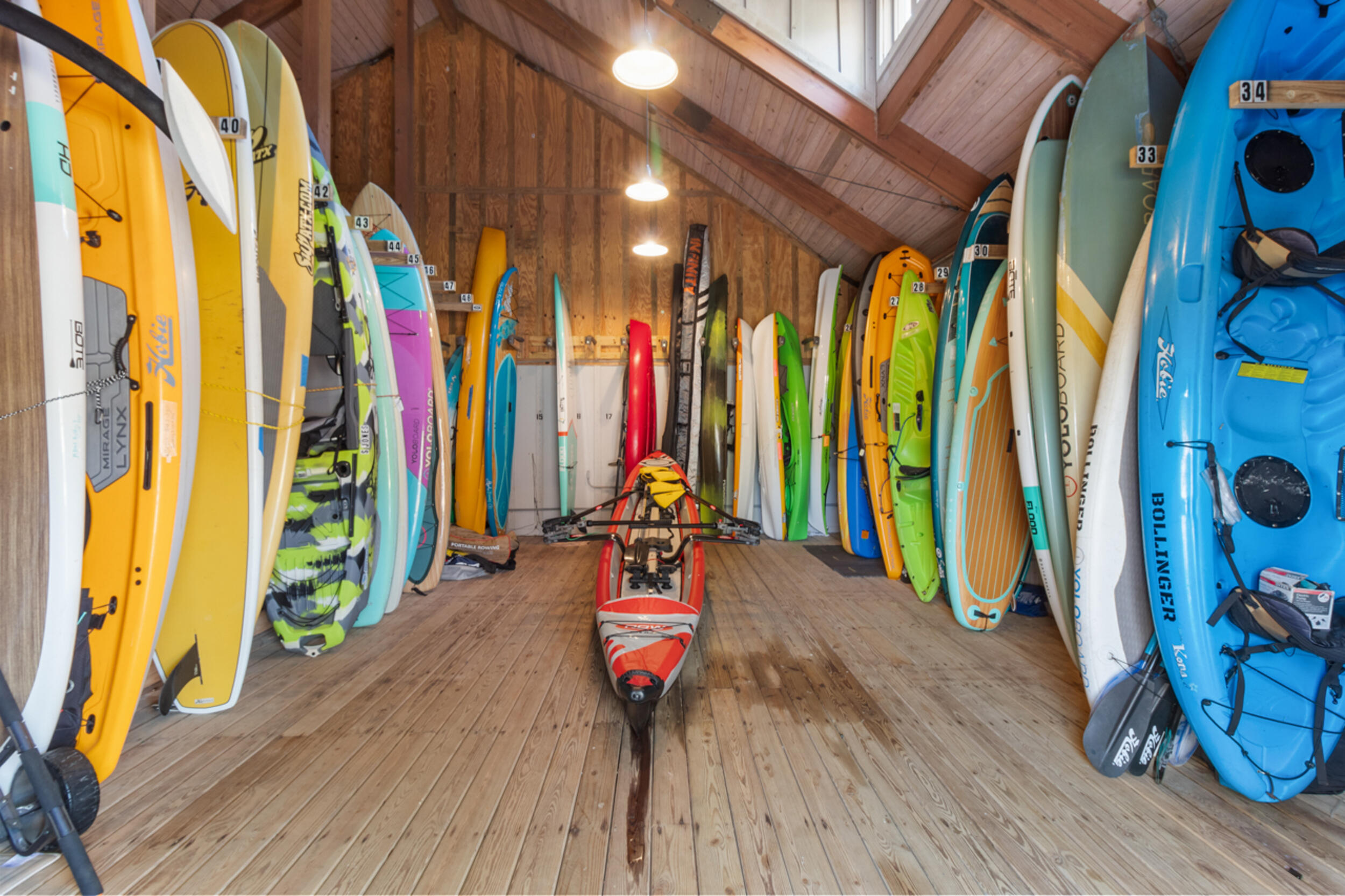 1101 Prospect Promenade, Unit 403 Panama City Beach, FL 32413 - Photo 42 of 74 a view of an entryway with wooden floor and stairs