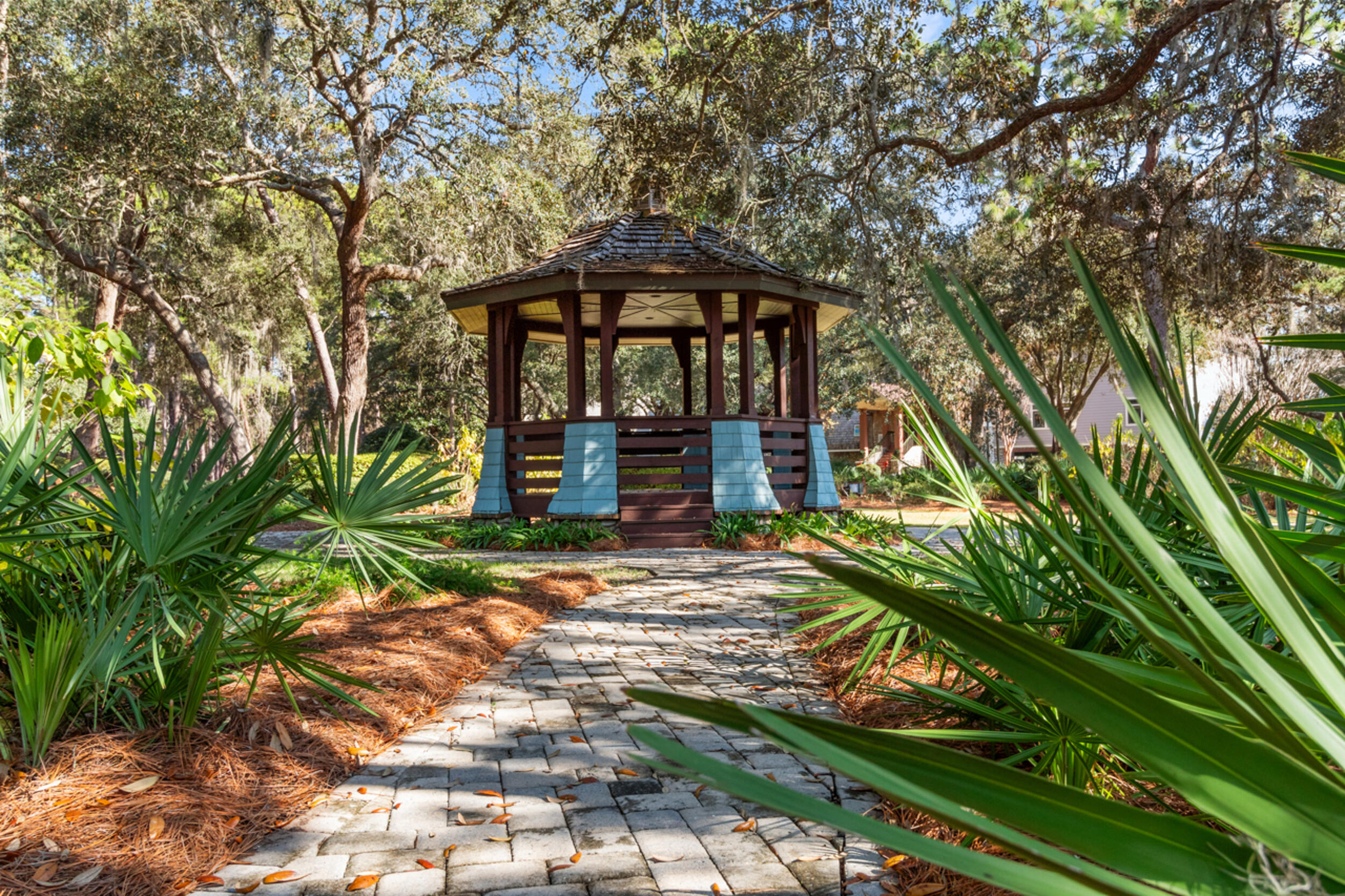 1101 Prospect Promenade, Unit 403 Panama City Beach, FL 32413 - Photo 67 of 74 a front view of a house with garden