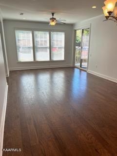 311 Centennial Bluff Boulevard Oak Ridge, TN 37830 - Photo 11 of 28 an empty room with wooden floor and windows