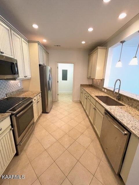 311 Centennial Bluff Boulevard Oak Ridge, TN 37830 - Photo 8 of 28 a kitchen with stainless steel appliances granite countertop a sink stove and refrigerator