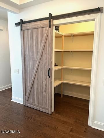 311 Centennial Bluff Boulevard Oak Ridge, TN 37830 - Photo 9 of 28 a view of walk in closet with empty racks