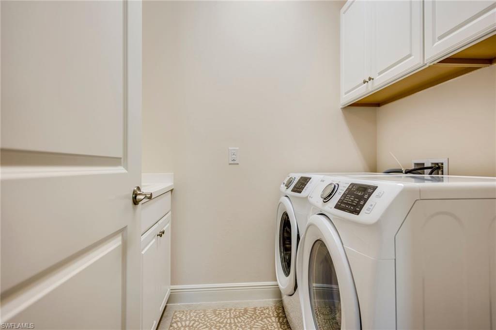 3782 Canopy Circle Naples, FL 34120 - Photo 26 of 31 a utility room with dryer and washer