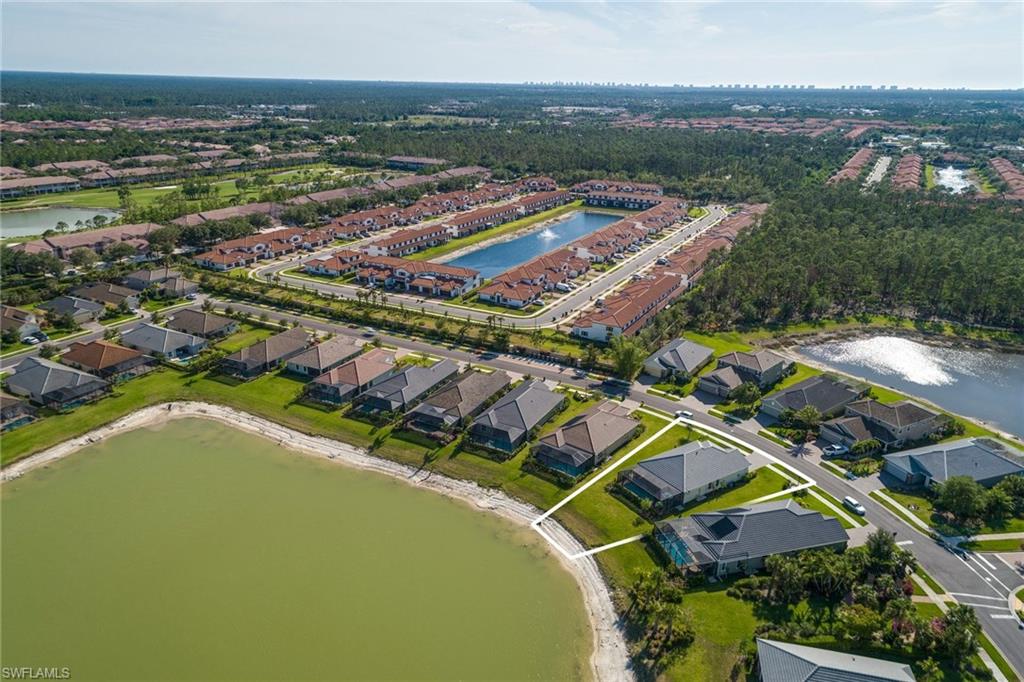 3782 Canopy Circle Naples, FL 34120 - Photo 30 of 31 an aerial view of a house with a garden