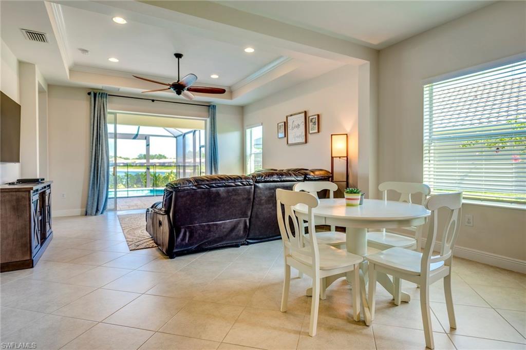 3782 Canopy Circle Naples, FL 34120 - Photo 5 of 31 a view of a dining room with furniture