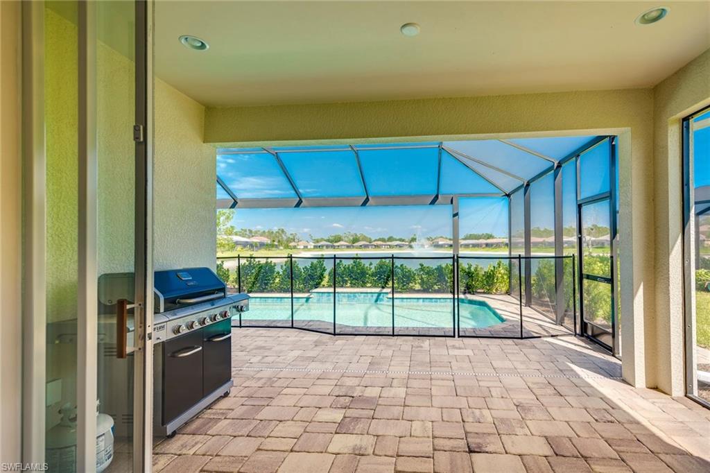 3782 Canopy Circle Naples, FL 34120 - Photo 10 of 31 a view of a backyard with a small cabin