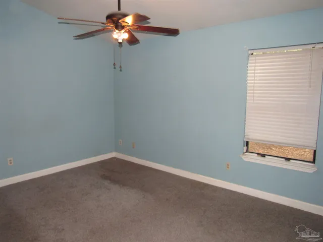 a view of a small space with a fan