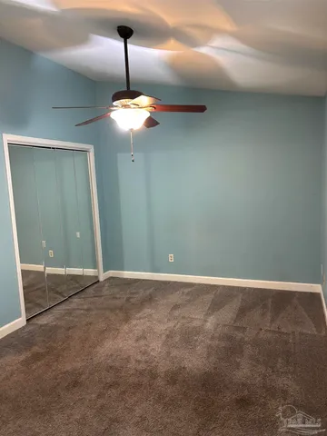 a bathroom with a granite countertop bathtub toilet and sink