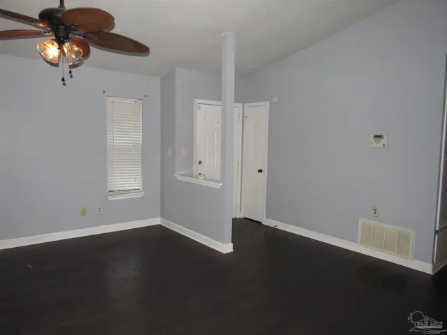 a view of room with hardwood floor