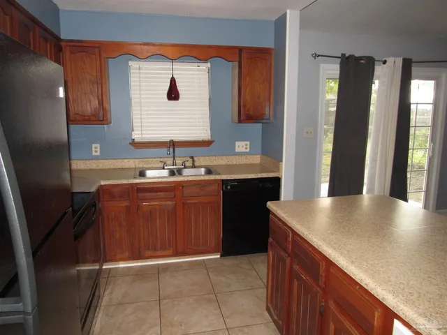 a bathroom with a sink a vanity and a mirror