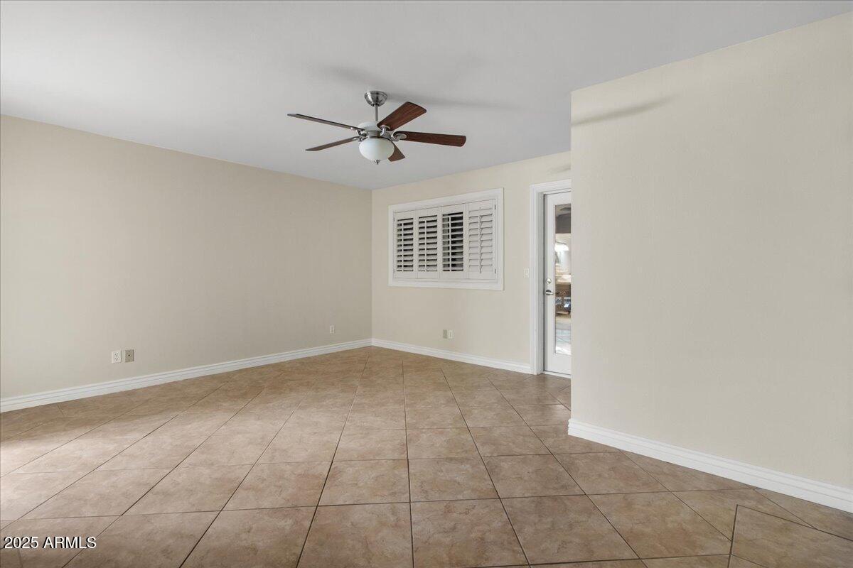 5750 North 10th Street, Unit 5 Phoenix, AZ 85014 - Photo 22 of 37 a view of an empty room with a window