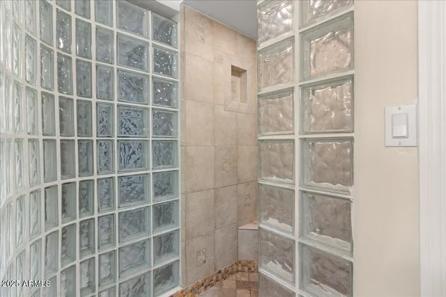 a view of a door with wooden floor