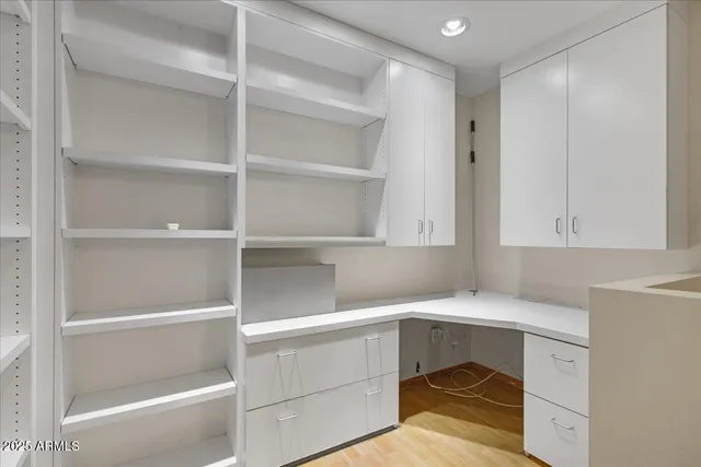 a view of an empty walk in closet