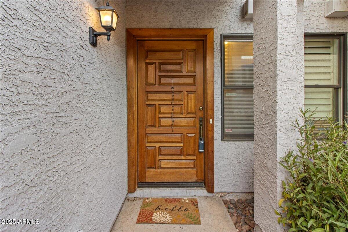 5750 North 10th Street, Unit 5 Phoenix, AZ 85014 - Photo 5 of 37 a view of a entryway door of the house