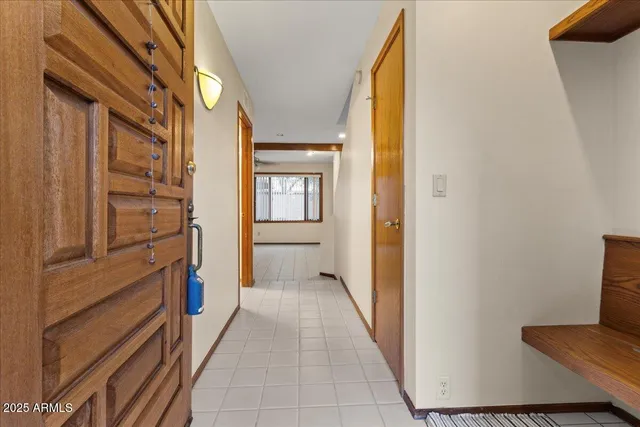 a view of a kitchen from the hallway