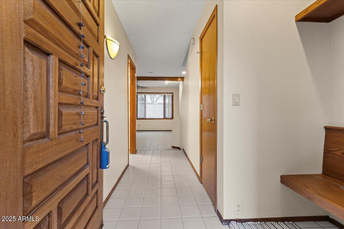 5750 North 10th Street, Unit 5 Phoenix, AZ 85014 - Photo 6 of 37 a view of a kitchen from the hallway