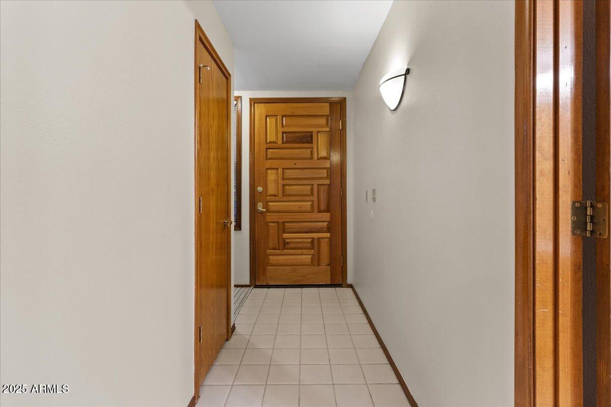 5750 North 10th Street, Unit 5 Phoenix, AZ 85014 - Photo 8 of 37 a view of a hallway with closet and bathroom