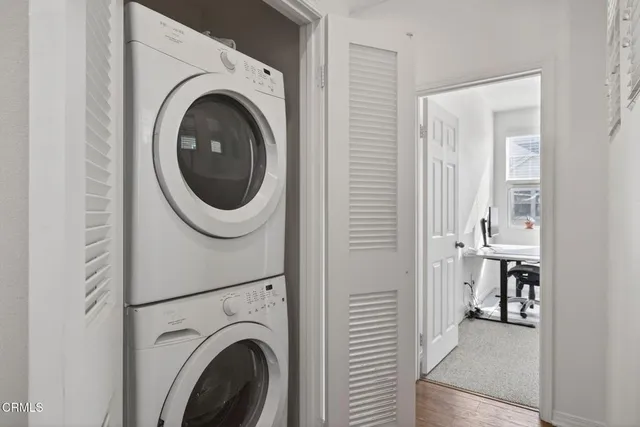 a view of a workspace with furniture