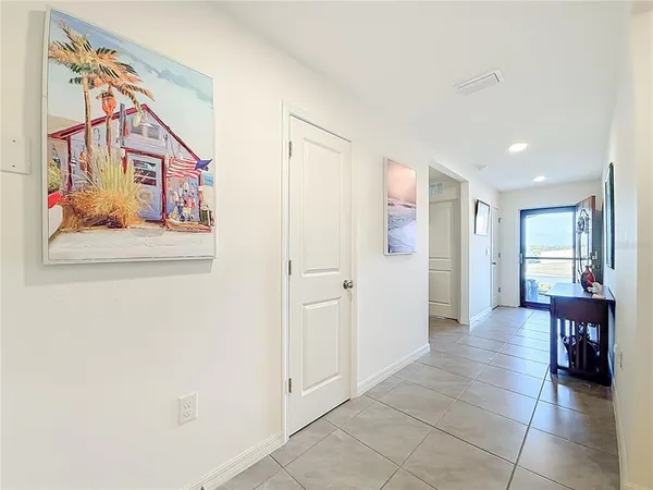 a large kitchen with stainless steel appliances granite countertop a large counter top and a stove top oven