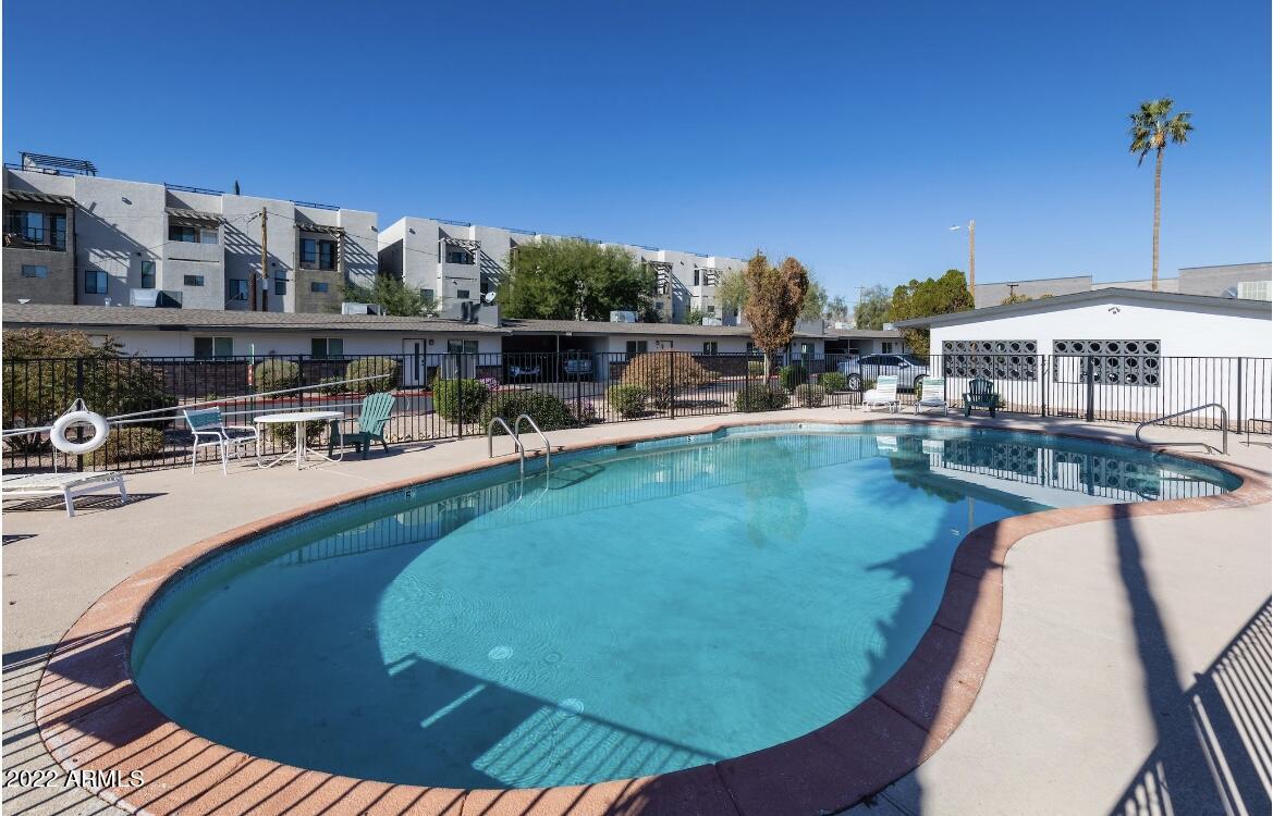 2020 West Hayward Avenue, Unit 31 Phoenix, AZ 85021 - Photo 11 of 13 a view of a swimming pool with a patio