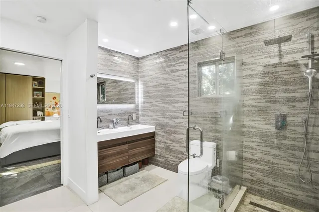 a bathroom with a bathtub and a sink