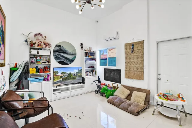 a living room with furniture and a couch