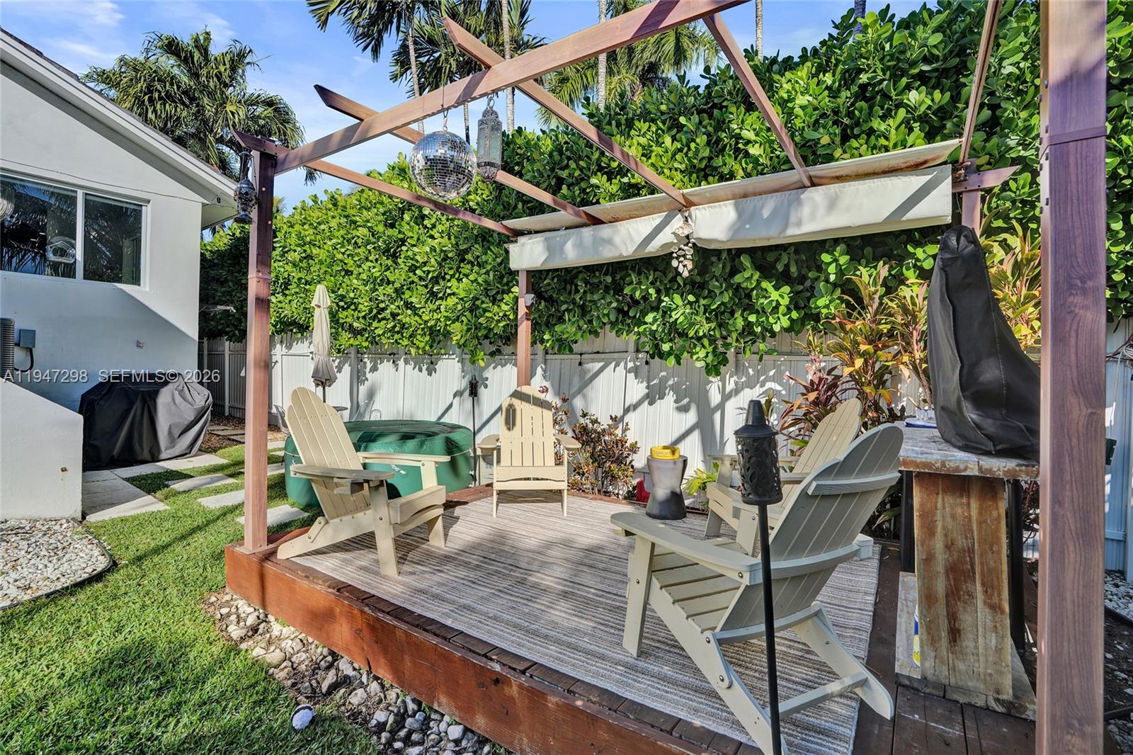 9181 Byron Avenue Surfside, FL 33154 - Photo 7 of 51 a view of a house with backyard and sitting area