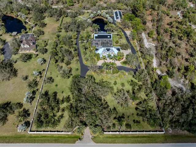 a view of a hallway with furniture and entryway