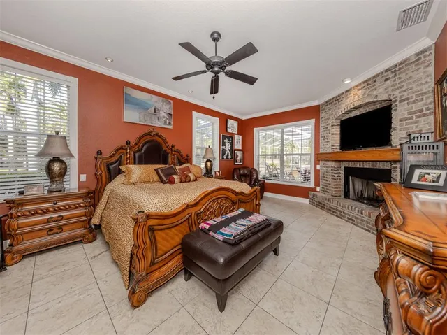 a living room with furniture gym equipment and a large window