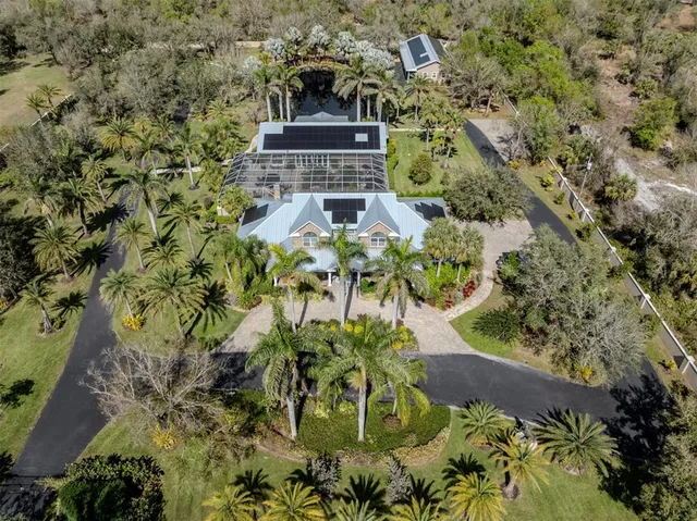 a living room with lots of furniture and a flat screen tv