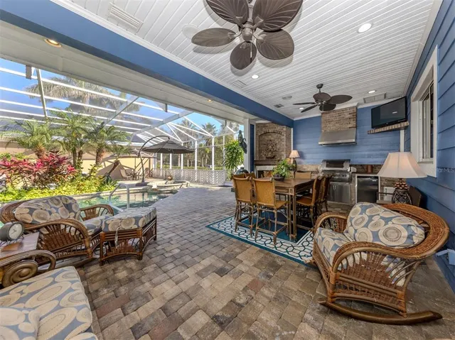 a bathroom with a granite countertop sink a toilet and a mirror