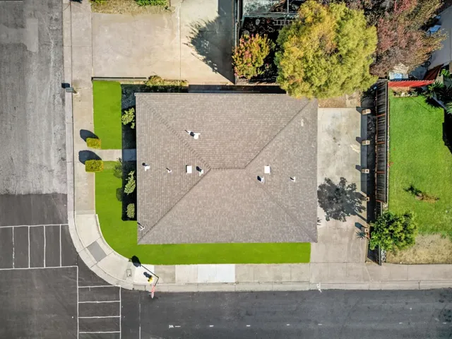 an aerial view of a highlighted house