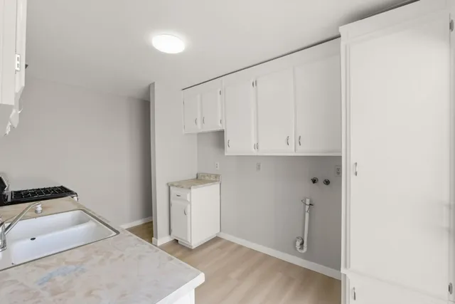 a view of room with hardwood floor