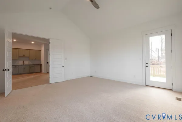 a view of a kitchen with a sink and a cabinet