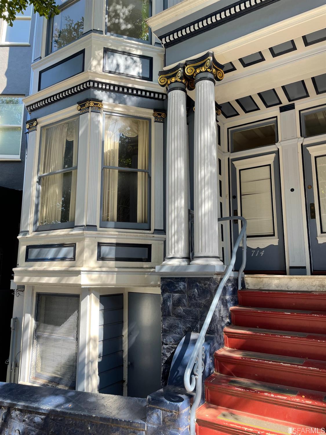 714 Fillmore Street San Francisco, CA 94117 - Photo 1 of 14 a view of staircase with white walls and a chandelier