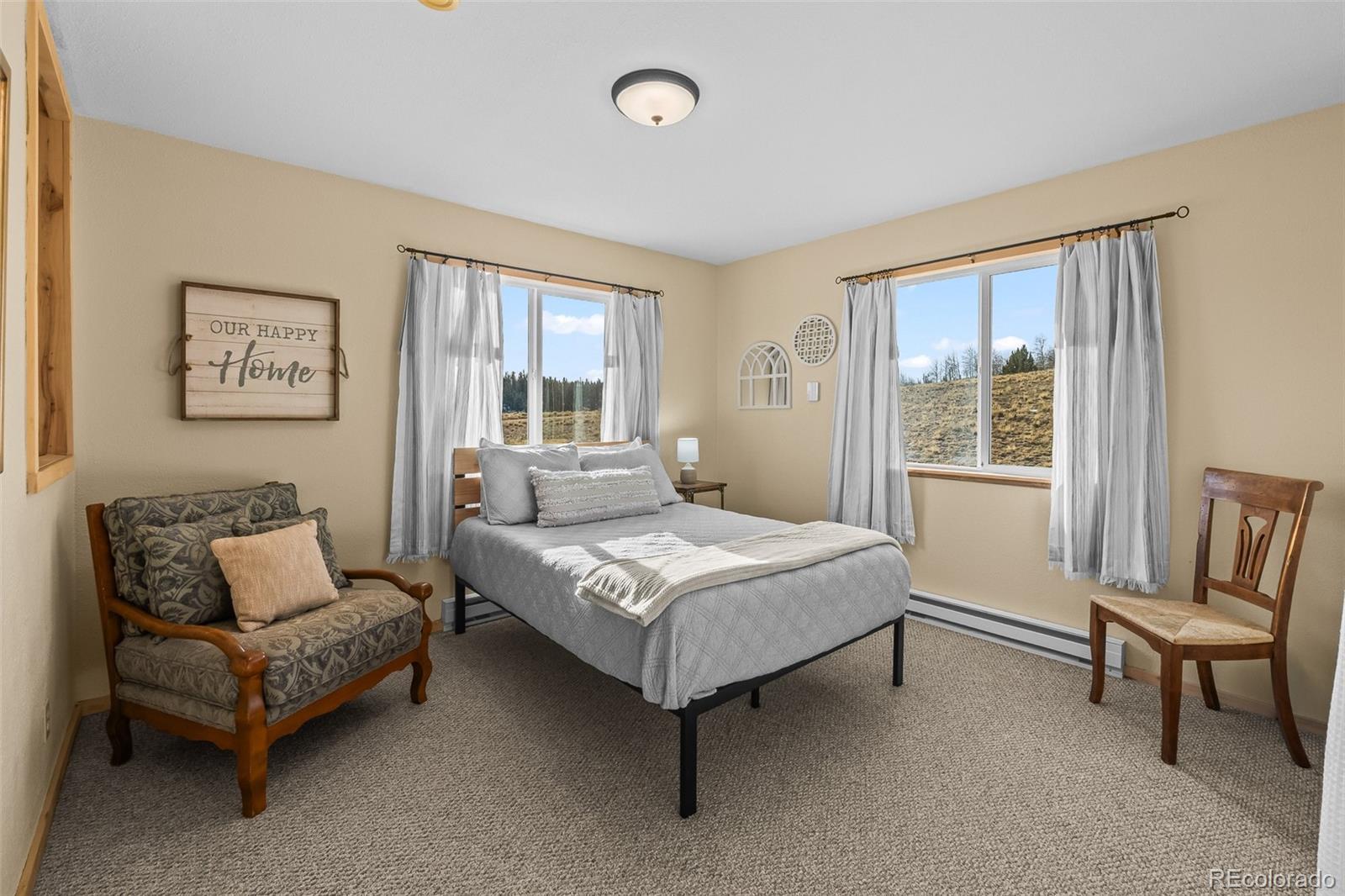 4018 Arrowhead Drive Como, CO 80456 - Photo 34 of 50 a bedroom with a bed and a couch