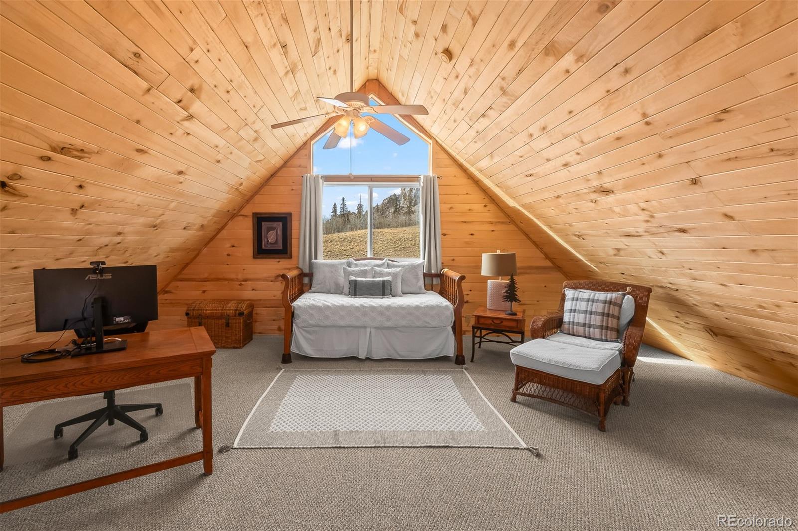 4018 Arrowhead Drive Como, CO 80456 - Photo 37 of 50 a balcony with furniture and a potted plant