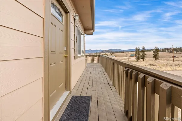 a balcony with an outdoor space