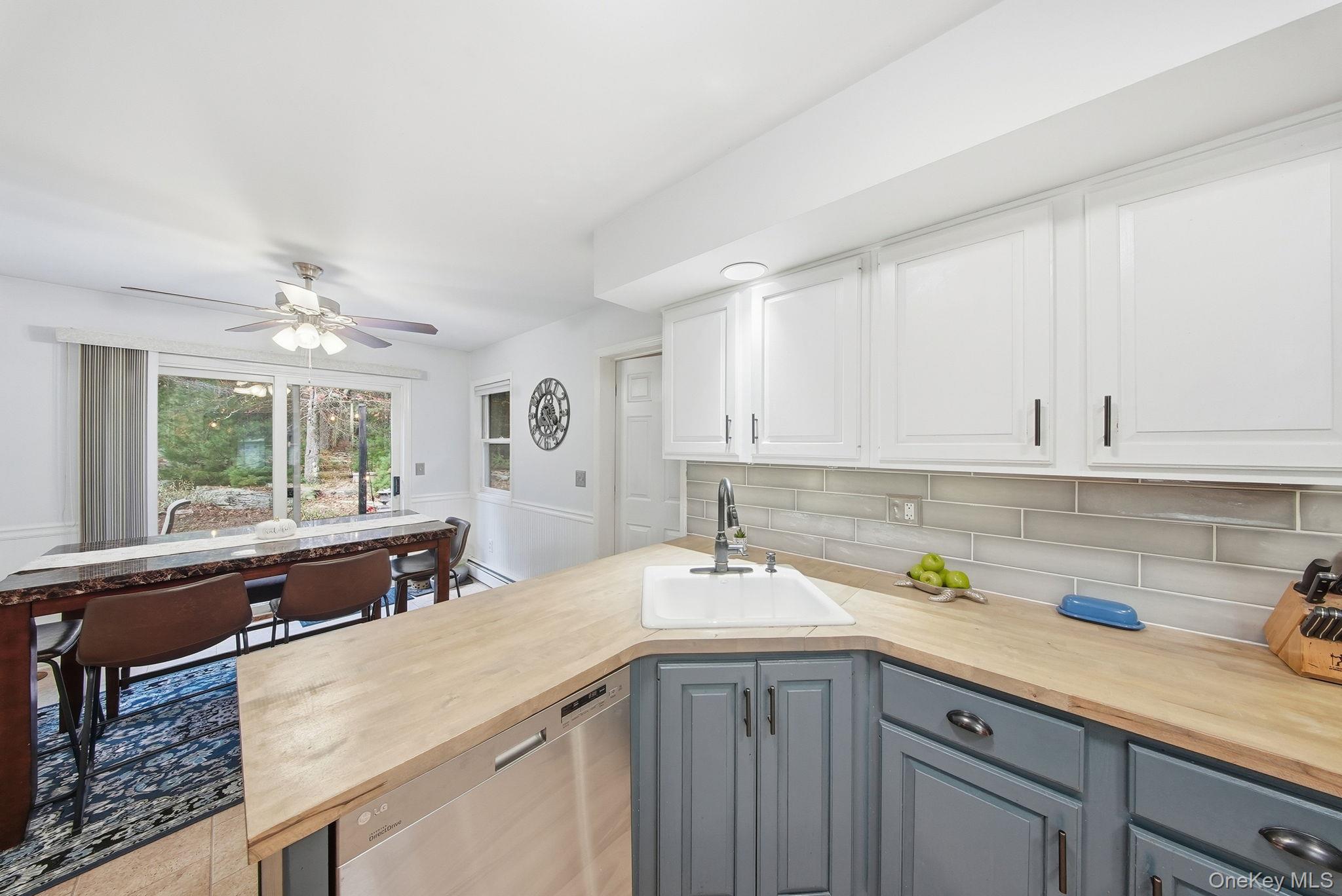 44 Florio Earl Road Wurtsboro, NY 12790 - Photo 16 of 42 a kitchen with a sink and cabinets
