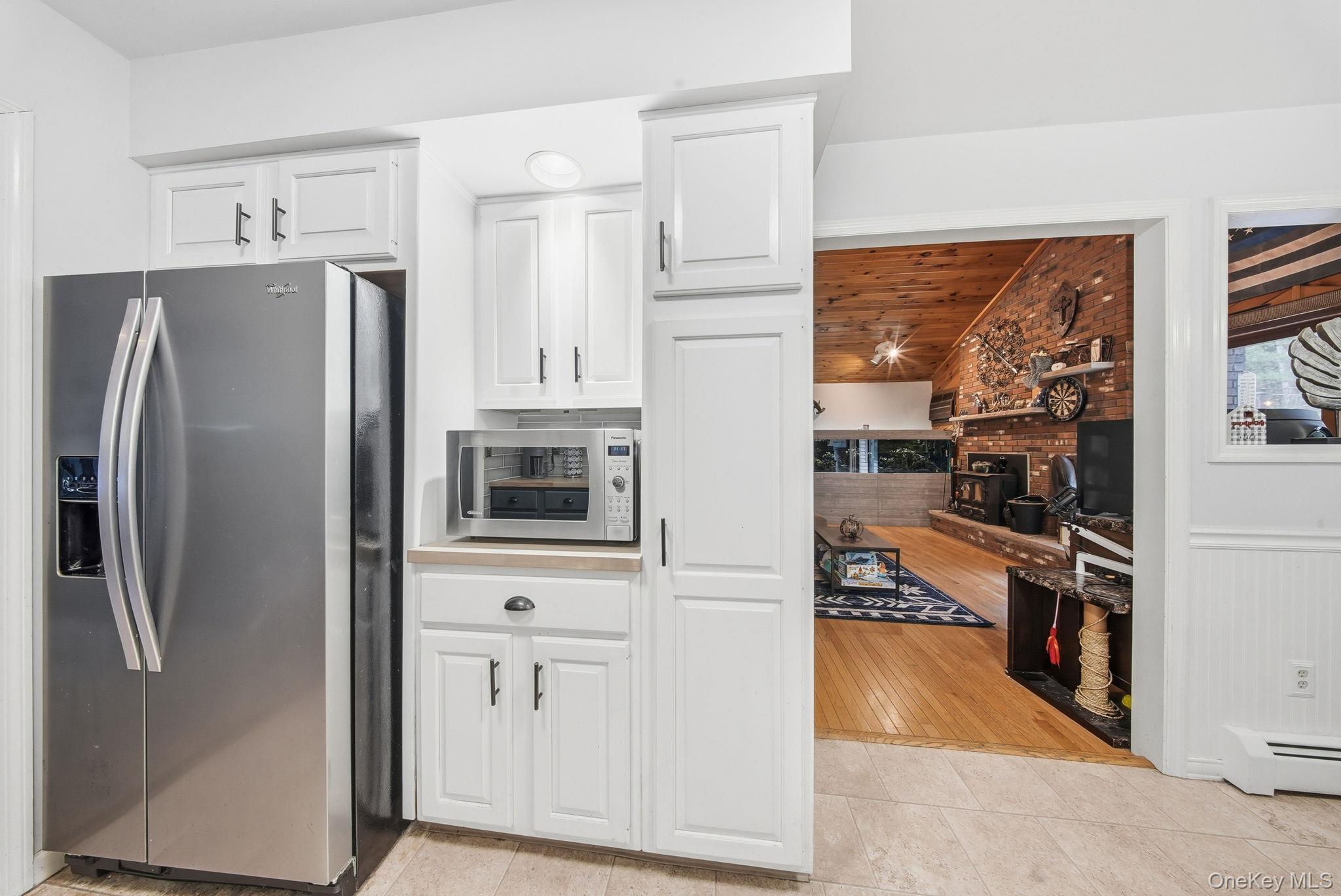 44 Florio Earl Road Wurtsboro, NY 12790 - Photo 19 of 42 a kitchen with stainless steel appliances a refrigerator stove and sink