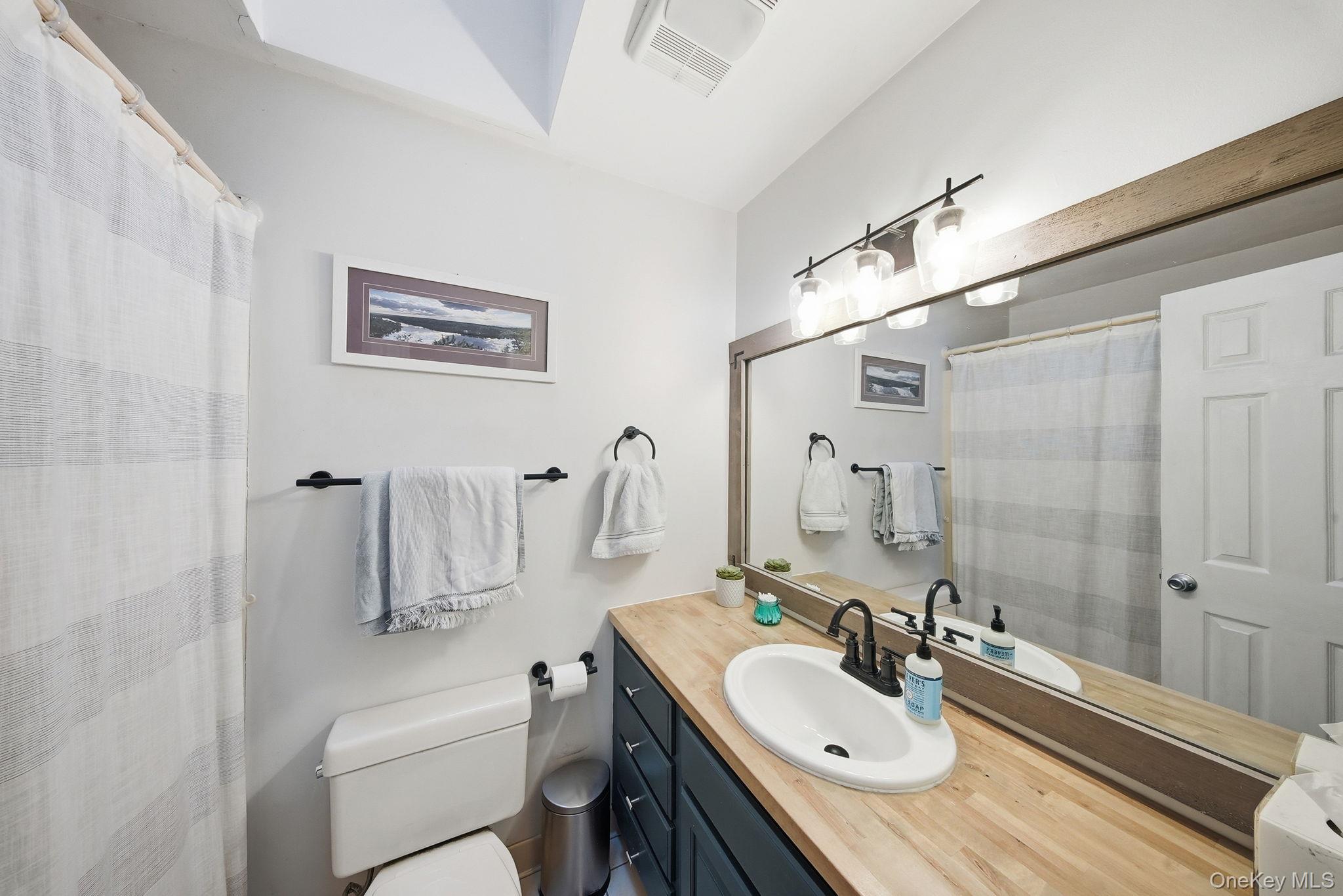 44 Florio Earl Road Wurtsboro, NY 12790 - Photo 21 of 42 a bathroom with a sink double vanity granite tub and shower