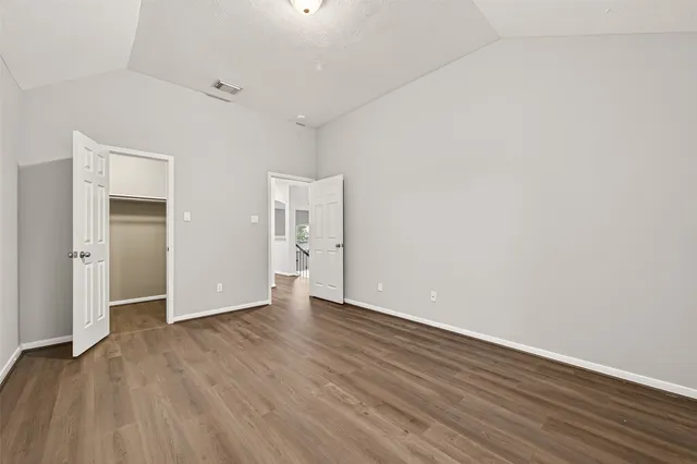 a view of an empty walk in closet