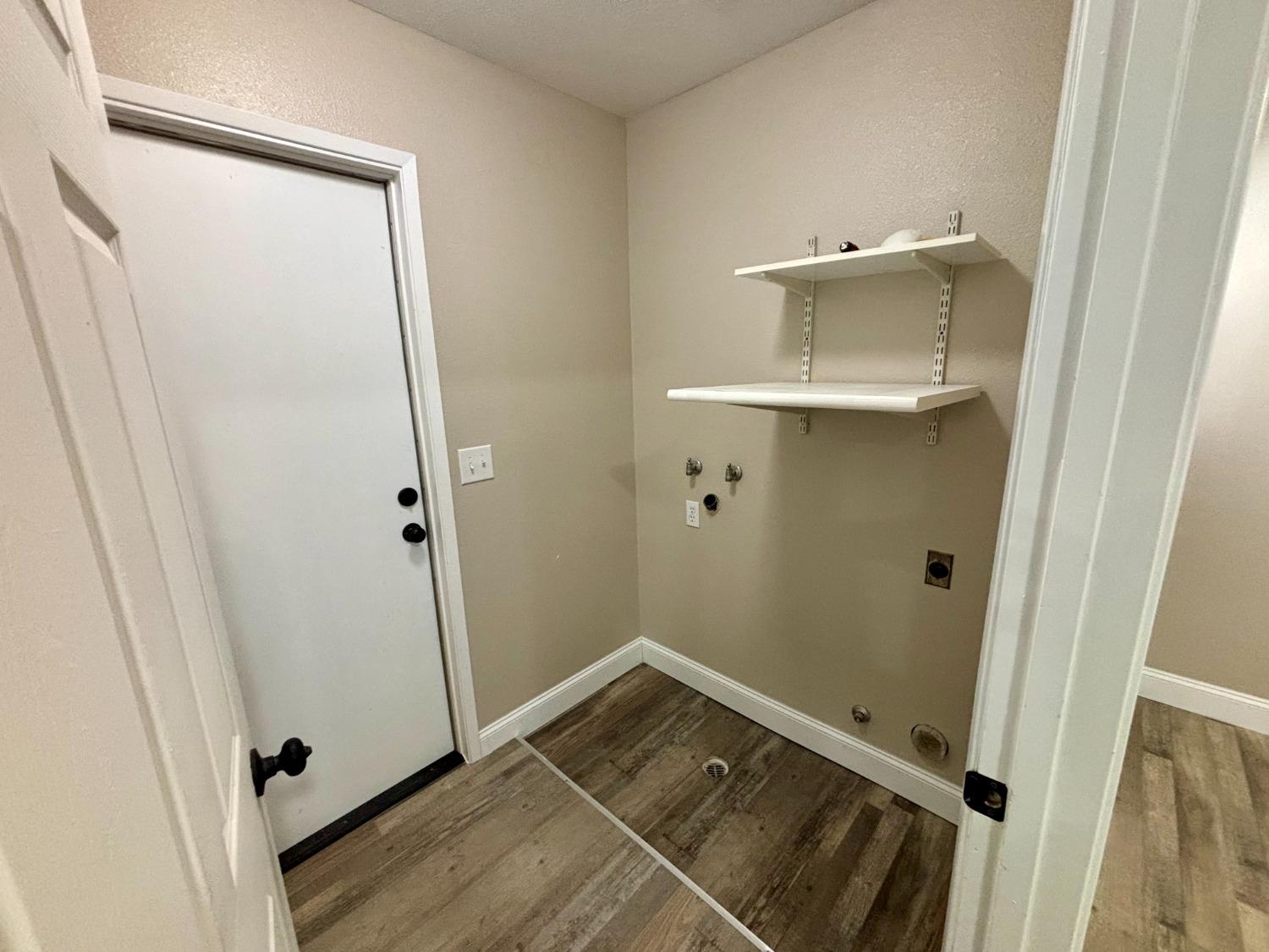 910 Cedar Lane Lemoore, CA 93245 - Photo 19 of 32 a bathroom with a sink and a mirror