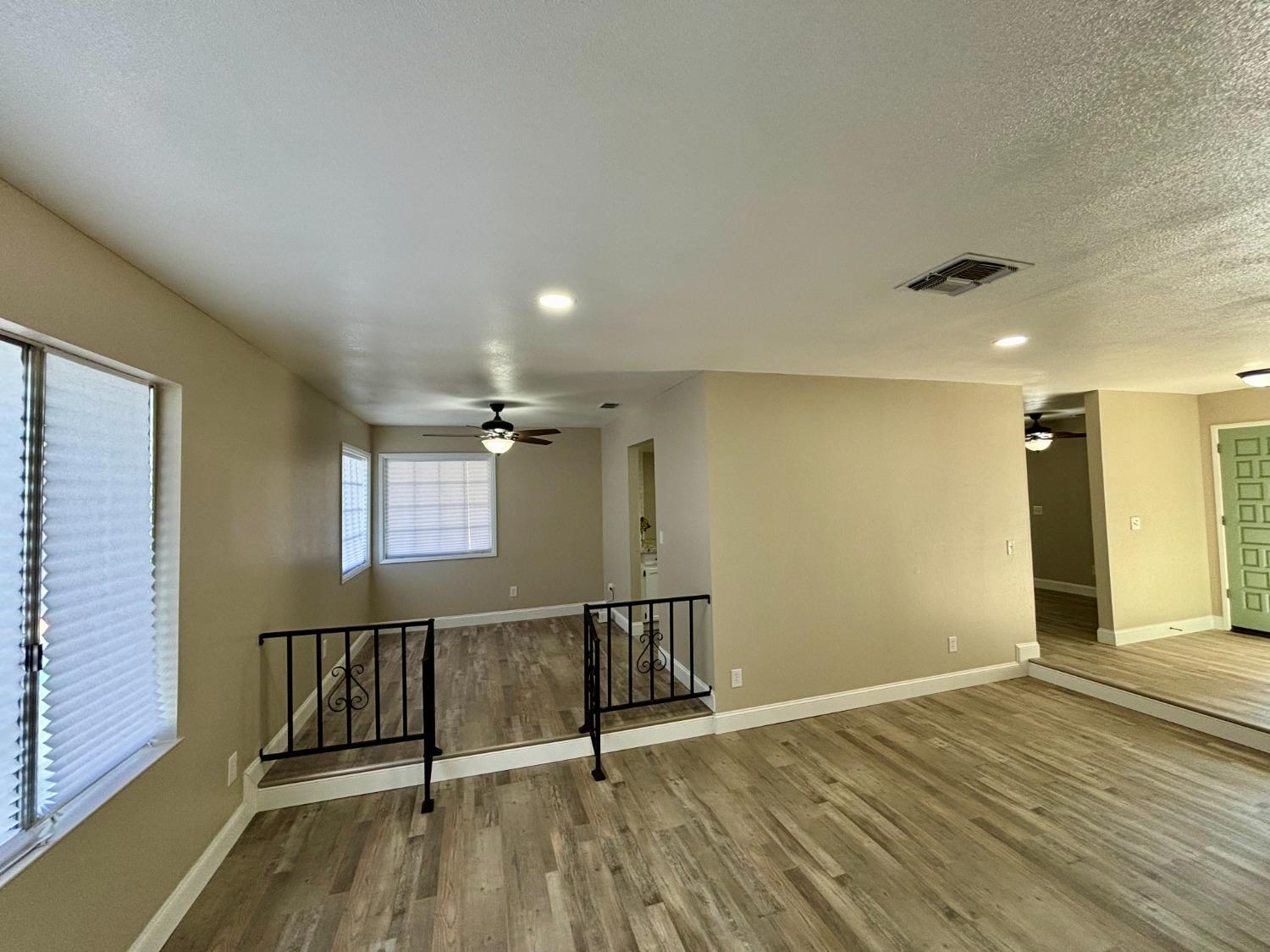 910 Cedar Lane Lemoore, CA 93245 - Photo 24 of 32 a view of entryway with wooden floor